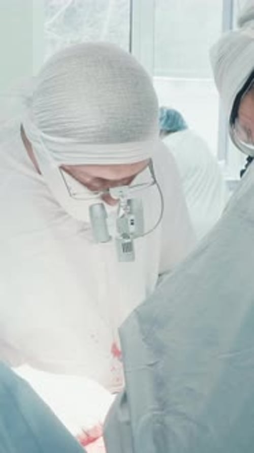 Surgeons Perform Operation in Bright Operating Room