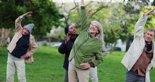 Yoga class, park and elderly people with instructor exercise together in nature for health