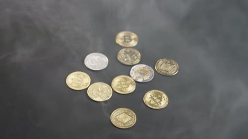 Cryptocurrency Coins with Smoke on a Dark Background
