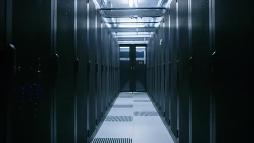 Data Center With Between Two Rows of Fully Operational Server Racks. Modern Telecommunications, Clo