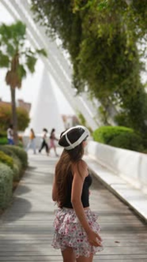Virtual Reality Experience in a Park Two People with Headsets Enjoying Outdoor Leisure