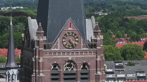 Aerial View of Eindhoven Church with Clock and Urban Surroundings