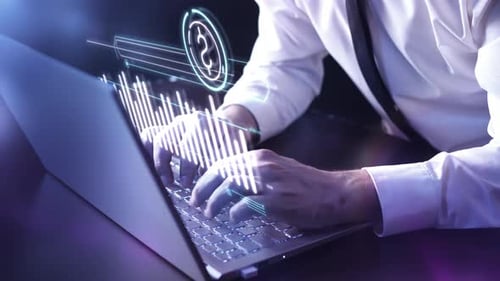 The Man At The Laptop Works On The Stock Exchange