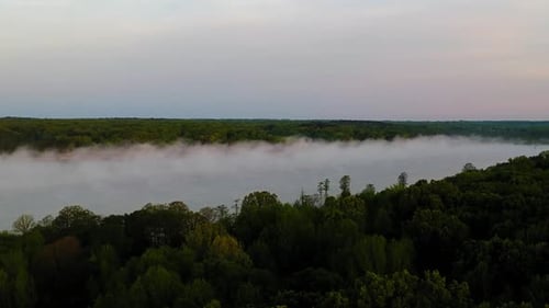 fog on lake in the morning