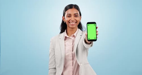 Happy woman, business and pointing to green screen of phone for advertising space