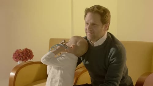 Loving Father and Child Playing at Home