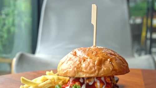 Close Up of a Delicious Burger and Fries