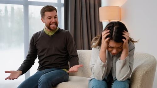 Man Arguing with a Woman in a Home