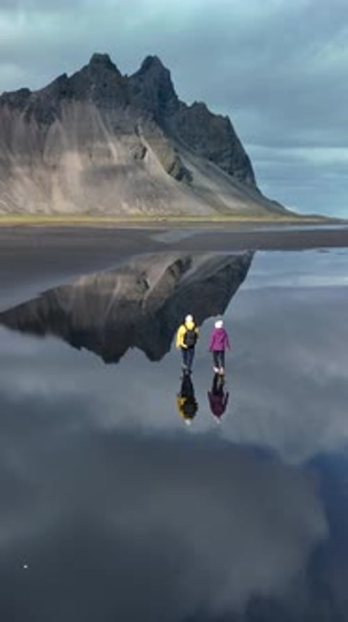 Exploring the Breathtaking Reflections of Stokksness Mountain in Icelands Serene Landscape