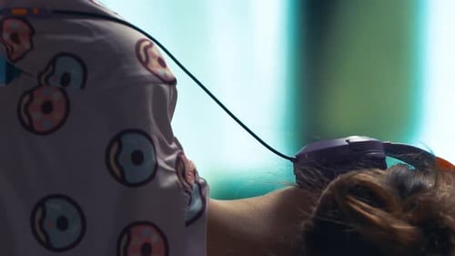 Girl Playing Virtual Reality Game with Headset