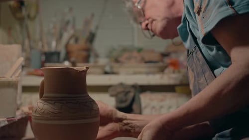 Artisan Creates Pottery in a Workshop