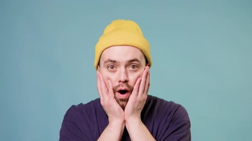 Man Expresses Shock in Close Up Portrait