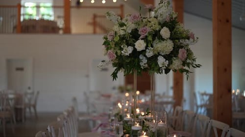Elegant Wedding Reception Table with Floral Centerpiece