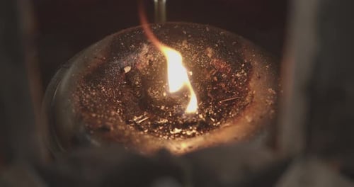 Flame in a buddhist temple - Relaxation and Meditation in a spiritual place in Thailand - Meditative