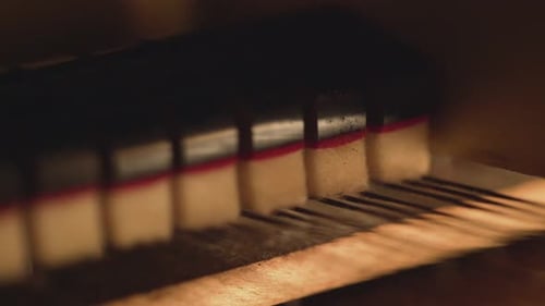 close up detail of piano strings and hammers , abstract music video artistic footage music instrumen
