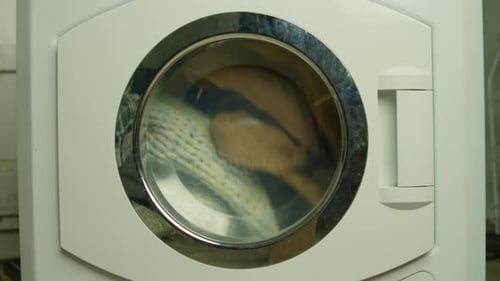 Clothes Spinning inside a Washing Machine