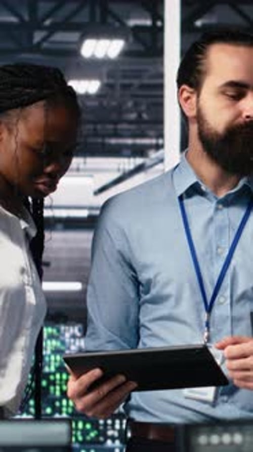 Vertical Video Happy Data Center Colleagues Collaborating on Software Development