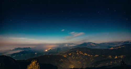 Night Landscape Timelapse with Stars Moving on Sky at Mountain Vacation Travel
