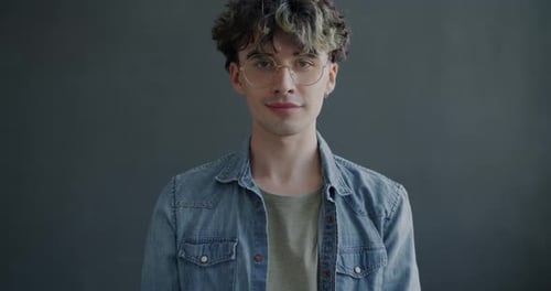 Young Man Gives OK Hand Gesture