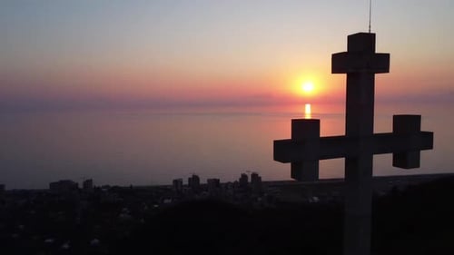 Cross with sunset background
