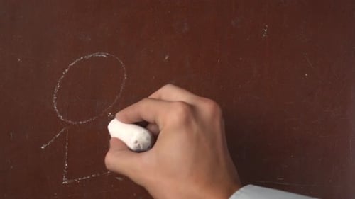 Hand Drawing Stick Figure Family in Chalk