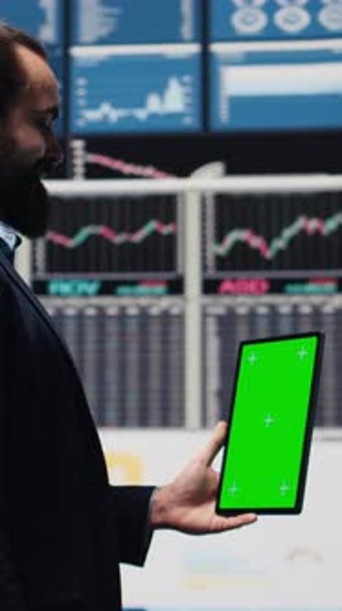 Vertical Video Entrepreneur Holds Tablet with Copy Space Screen and Leveraging Dashboards