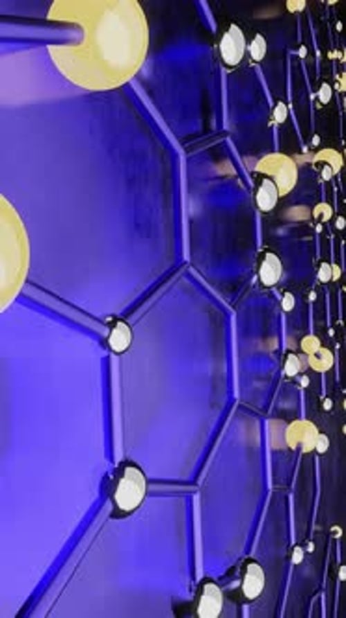 Vertical VJ loop animation background. Metal and luminous balls are connected by honeycombs. The cam