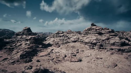 Expansive Arid Plain with Scattered Outcrops for Drone Backgrounds
