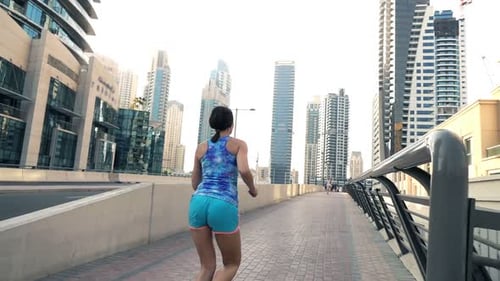 Woman Jogging Near Street In City, Super Slow Motion 240fps