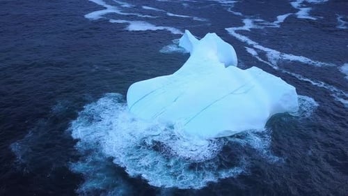 Iceberg floating near the coast