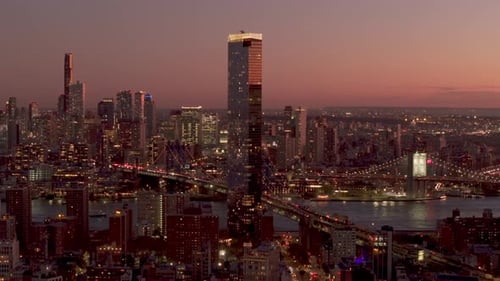 Golden Sunset Illuminating One Manhattan Square Residential Tower in the Two Bridges District Aerial