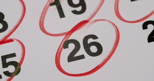 CloseUp Of Calendar With Important Date Marked In Red Circle