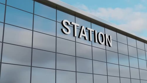 Airplane Passing Over a Station Building