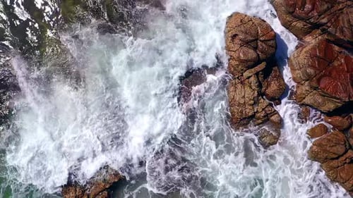 Sea Waves Crashing On Rocky Shore Of Noosa Heads In Queensland, Australia - aerial