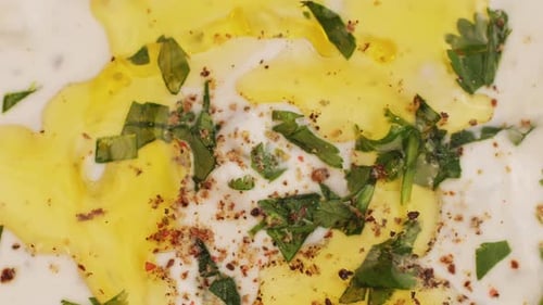 Greek Tzatziki Sauce of Salted Strained Yogurt or Diluted Yogurt Mixed with Cucumbers and Mint