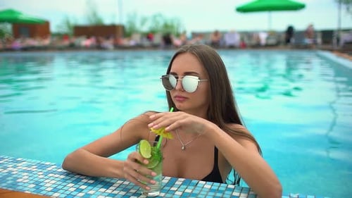 Beach Bikini Woman Summer Relax at Swimming Pool with Tropical Cocktail Holiday Vacation Travel