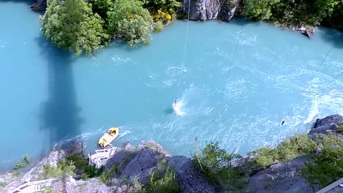 Man bungee jumping off Kawarau bridge in New Zealand
