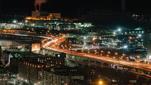 Incredible long exposure nighttime timelapse of a busy highway in downtown Toronto