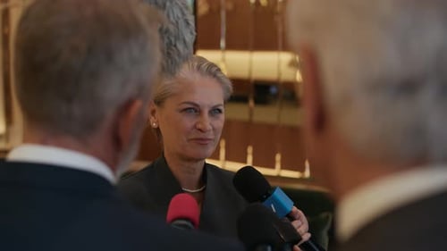 Woman Giving Interview at Corporate Press Conference
