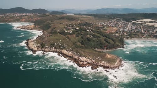 Aerial View of the Brazilian Coastline with Rough Atlantic Ocean Area Near the Town of Imbituba