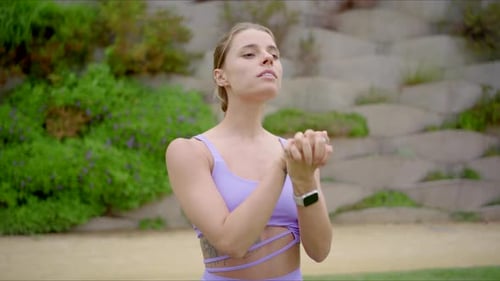 Blonde Woman Prepares for Outdoor Exercise