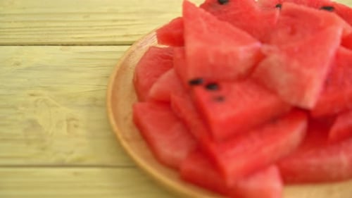 fresh watermelon sliced on plate