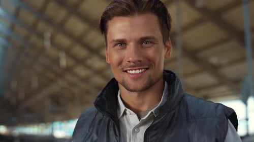 Handsome Man Smiling in Barn