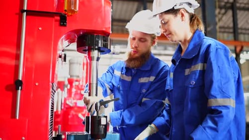 Heavy industry technology engineer Machine builder in hard hat and electrician manufacture worker