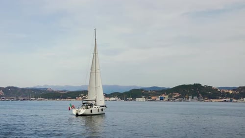 Around the Sailing Boat with Italian Flag
