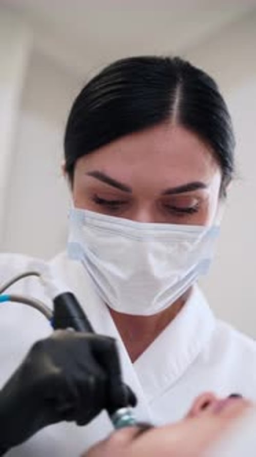Esthetician Performs Hydrafacial on Client in Cosmetic Clinic Hydro Dermabrasion Device Exfoliates