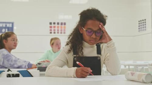 Student Studying in Classroom