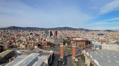 Panoramic aerial drone view of city traffic Plaza de Espana of Squares in Barcelona