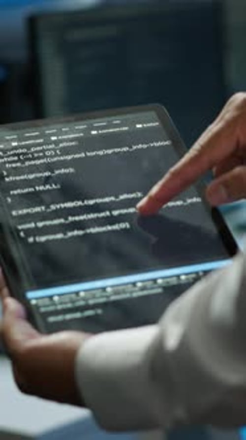 Vertical Video Programmer Using Device in Data Center Close Up