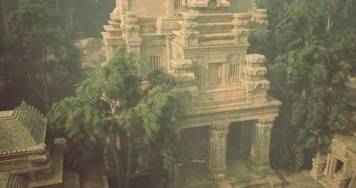 Majestic Ancient Temple Surrounded By Lush Greenery at Sunset